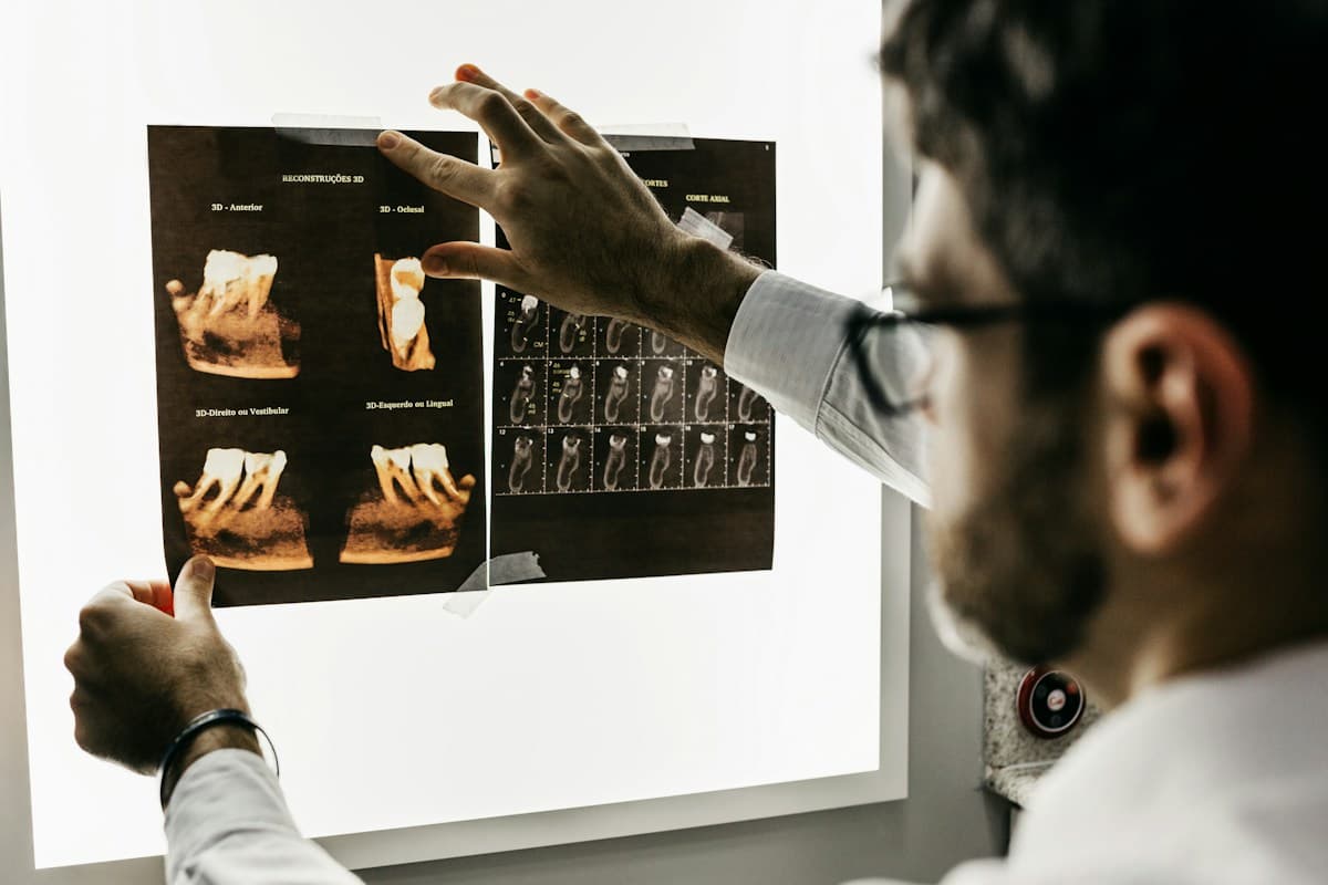 Modern dental treatment room with an ergonomic dental chair and large window